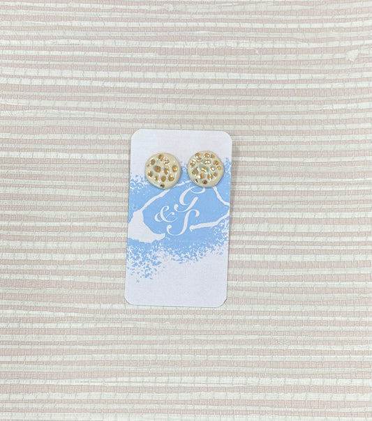 White and gold stud